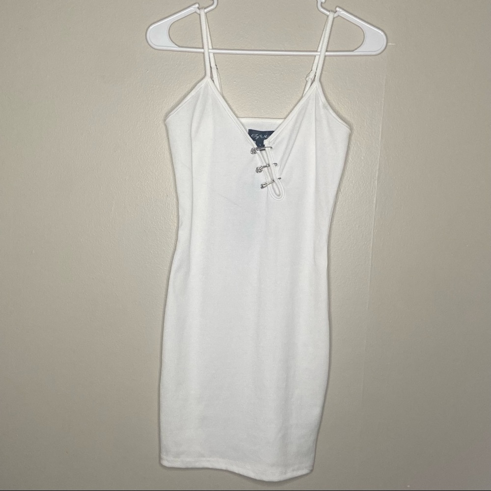 White dress with sparkly pins